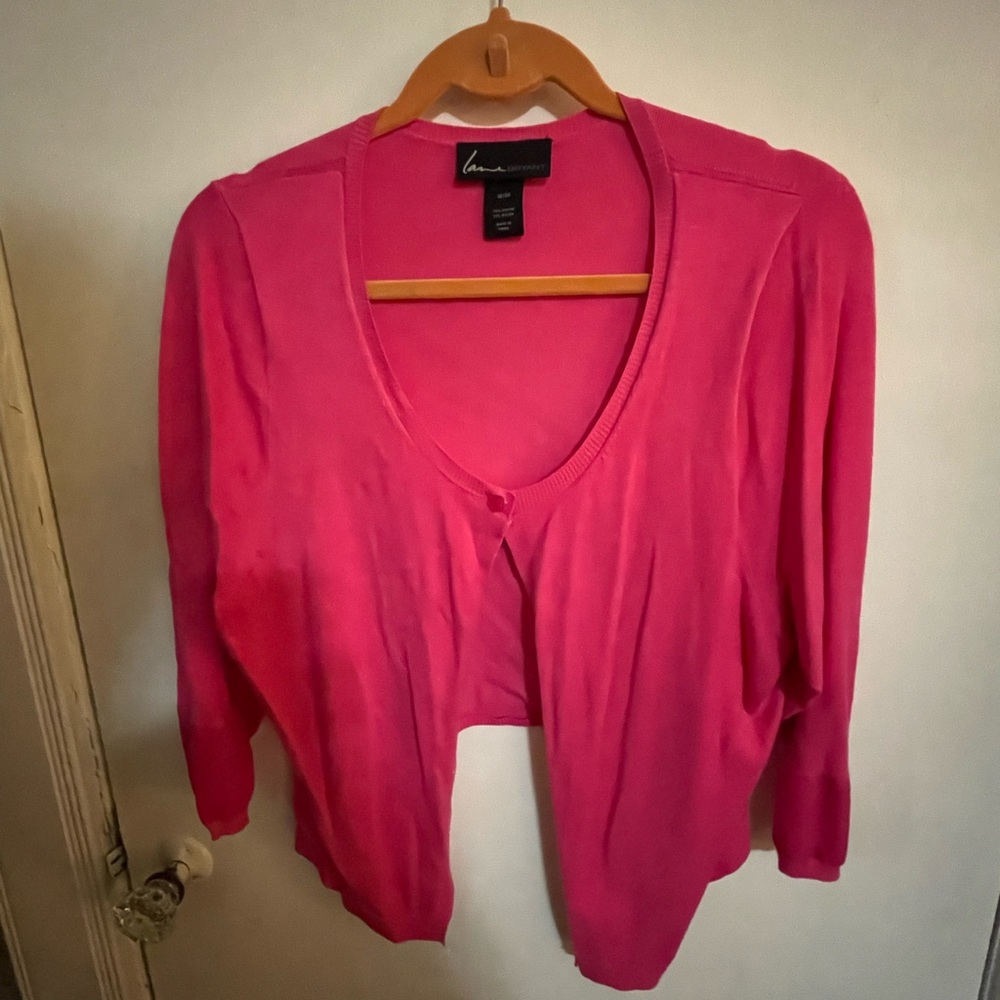 Thin, cropped, hot pink Lane Bryant cardigan sweater.